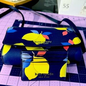 Adorable lemon Kate Spade set in excellent condition! Purse and wallet.